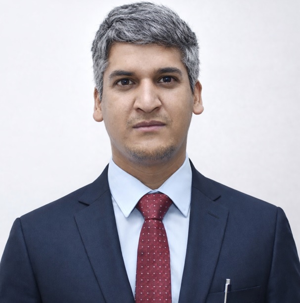 Dr Anuj Raturi